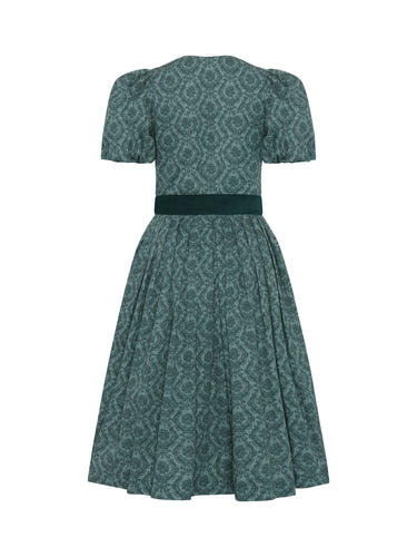 Rückseite Bedrucktes Dirndl mit Cordschürze und Ballonärmel