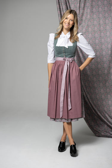 Dirndl mit Druckrock und Cord-Oberteil
