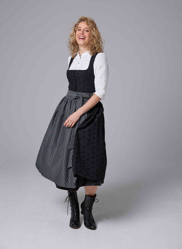 Besticktes Lochstickerei-Dirndl mit Jacquardschürz
